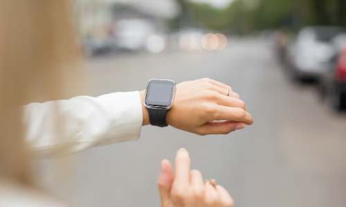 man looking at watch